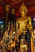 Luang Prabang, Laos - Wat Mai, detail of the Buddha altar inside the sim. 